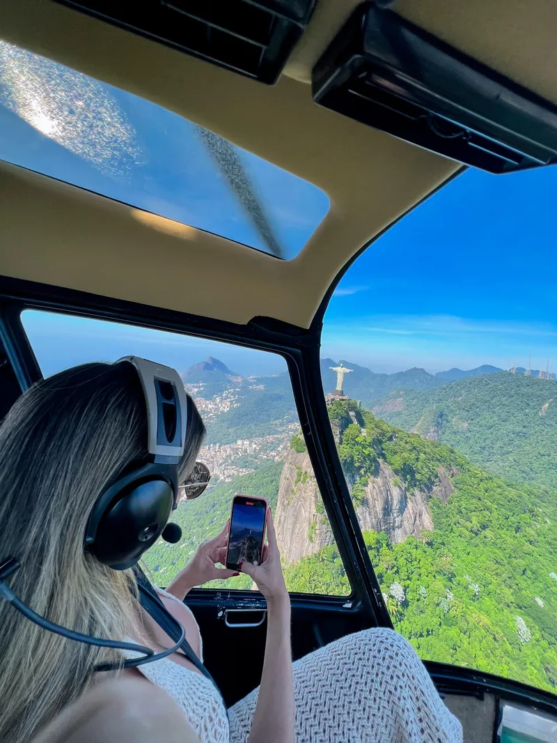 Aerial view of Copacabana beach and Sugarloaf Mountain on a helicopter ride in Rio de Janeiro, Brazil