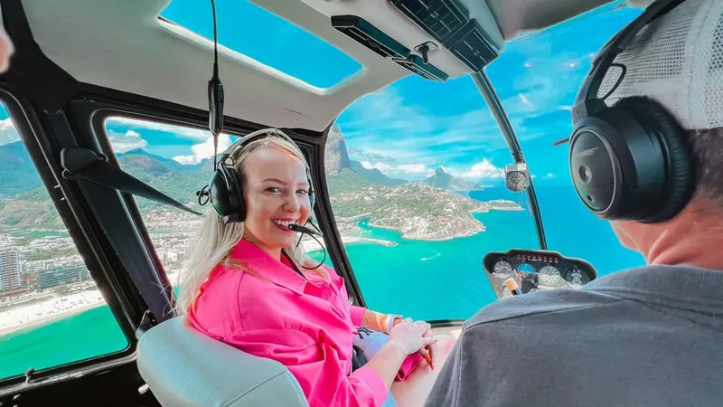 Helicopter flying over Sugarloaf Mountain and Guanabara Bay on a helicopter ride in Rio de Janeiro, Brazil